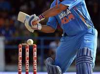 Dhoni clobbered 15 runs off the last over as India stole a one-wicket victory.