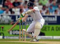England's Sam Robson hits the ball to score his maidan century on the second day of the second Test match between England and Sri Lanka at Headingley cricket ground in Leeds, northern England on June 21, 2014