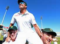 Jacques Kallis is lifted up by Morne Morkel and Graeme Smith during his lap of honour.