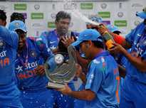 Mahendra Singh Dhoni with the trophy after India won the ODI series against England.